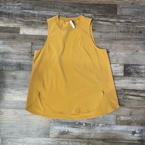 Women’s Athleta muscle tank with scalloped hem. Size large